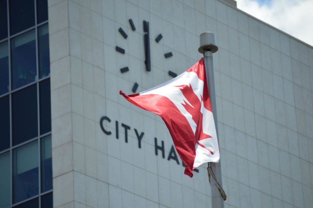 Canadian flag in front of Hamilton City Hall, Ontario